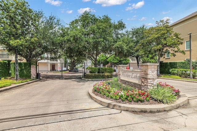 2206 Hilshire Glen Ct, Houston, TX 77080 - community sign featuring a gate