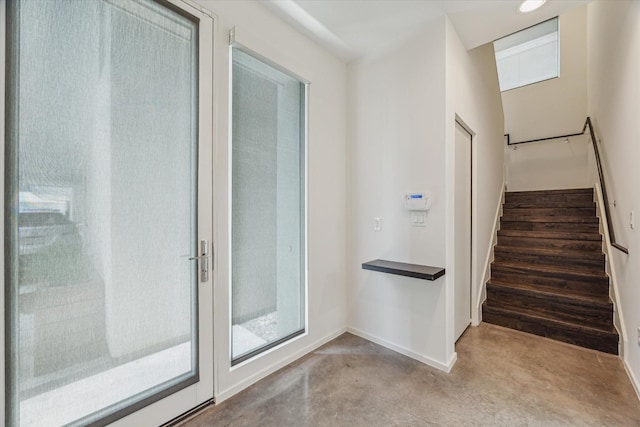 1728 Michigan St Unit C, Houston, TX 77006 - stairs featuring finished concrete floors and baseboards
