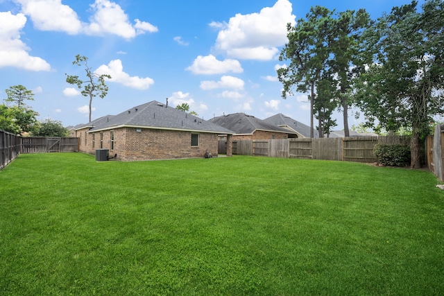 16863 Big Reed Dr, Humble, TX 77346 - back of house with brick siding and a fenced backyard
