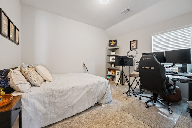 16863 Big Reed Dr, Humble, TX 77346 - bedroom with light carpet, vaulted ceiling, and a desk