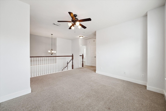 17011 Seminole Ridge Dr, Cypress, TX 77433 - spare room with a ceiling fan, carpet floors, and attic access