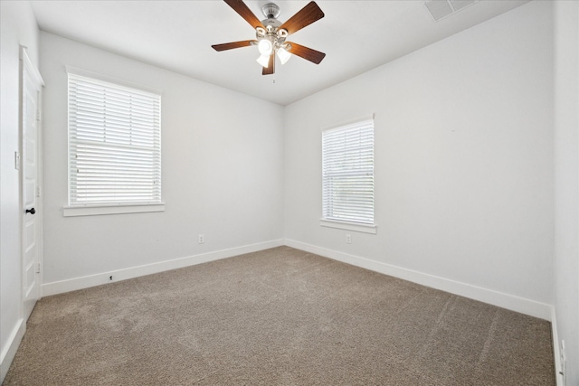 17011 Seminole Ridge Dr, Cypress, TX 77433 - carpeted spare room with baseboards and ceiling fan
