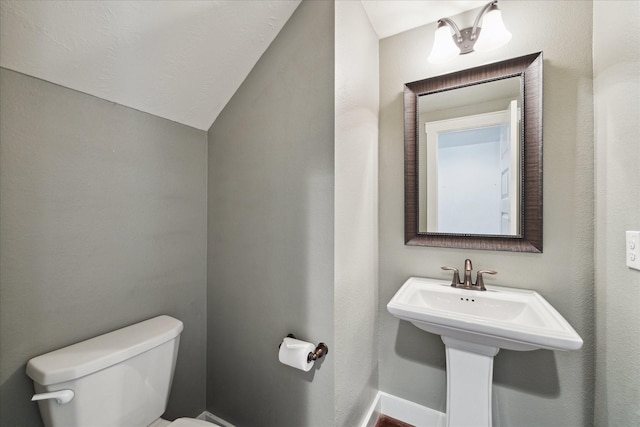 17011 Seminole Ridge Dr, Cypress, TX 77433 - half bathroom with toilet and lofted ceiling