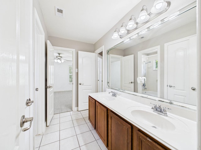 8122 Silver Lure Dr, Humble, TX 77346 - bathroom featuring double vanity, tile patterned flooring, shower / bath combination, and a ceiling fan