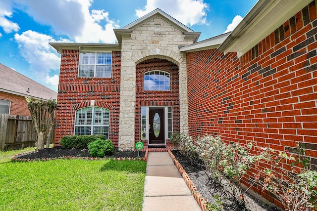 150 Nina Ln, Stafford, TX 77477 - property entrance featuring stone siding and brick siding