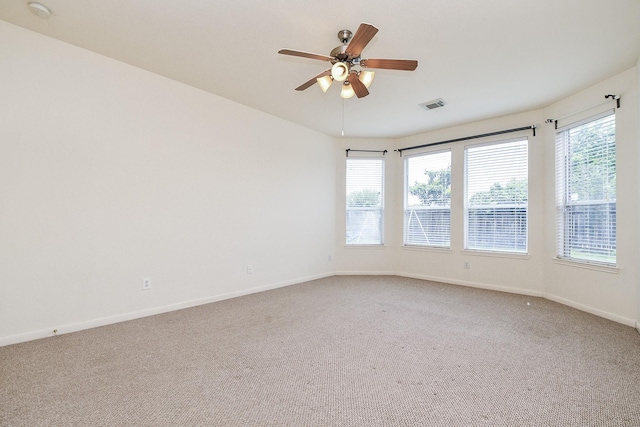 150 Nina Ln, Stafford, TX 77477 - empty room with carpet flooring, a smoke detector, and a ceiling fan
