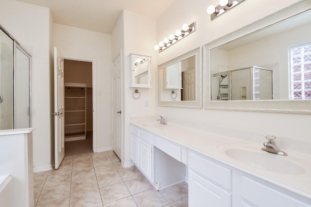 150 Nina Ln, Stafford, TX 77477 - bathroom featuring a stall shower, double vanity, and tile patterned floors