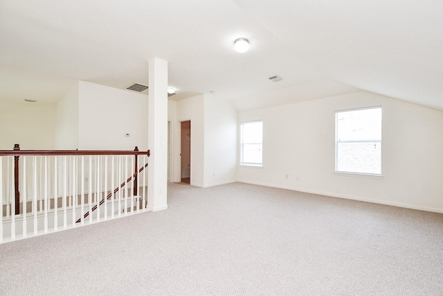 150 Nina Ln, Stafford, TX 77477 - empty room featuring carpet flooring and lofted ceiling