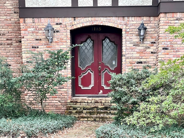 1115 Woodbank Dr, Seabrook, TX 77586 - doorway to property with brick siding
