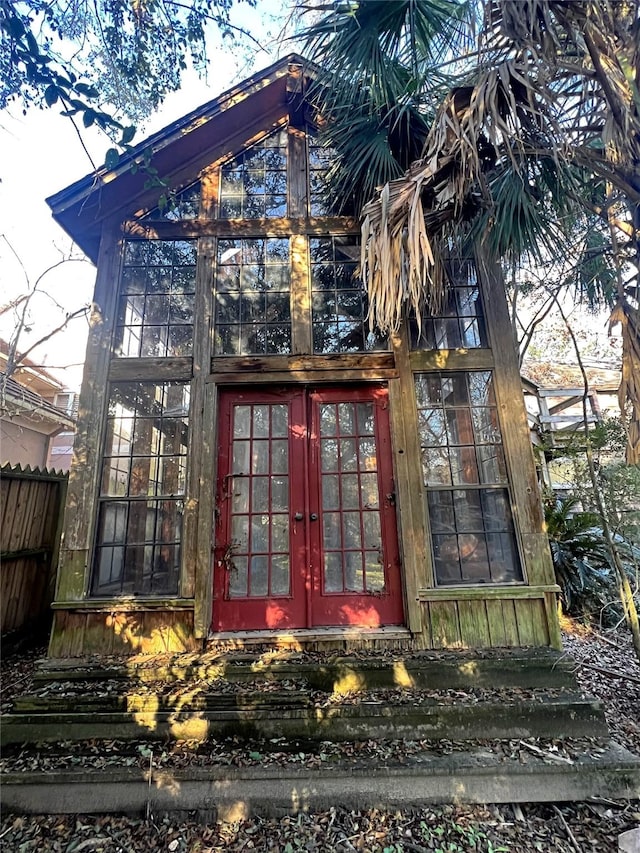 1115 Woodbank Dr, Seabrook, TX 77586 - view of side of home featuring french doors and entry steps