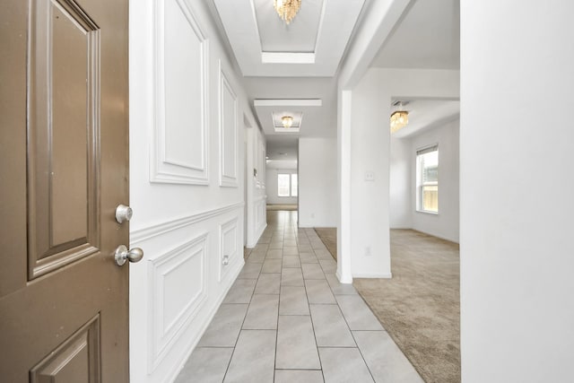 3619 Barkers Run Dr, Houston, TX 77084 - foyer entrance with light colored carpet and light tile patterned floors