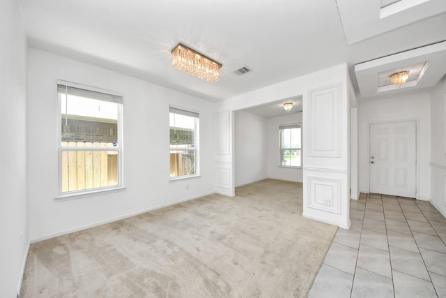 3619 Barkers Run Dr, Houston, TX 77084 - empty room featuring light carpet and light tile patterned flooring