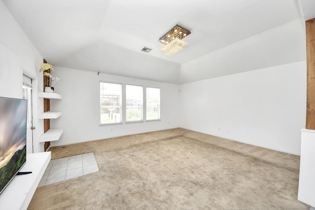 3619 Barkers Run Dr, Houston, TX 77084 - unfurnished living room with carpet, vaulted ceiling, and a chandelier
