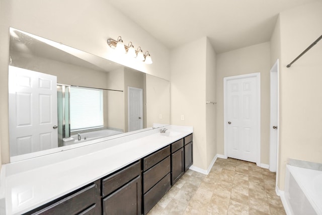 3619 Barkers Run Dr, Houston, TX 77084 - bathroom featuring a bath, double vanity, and a shower stall
