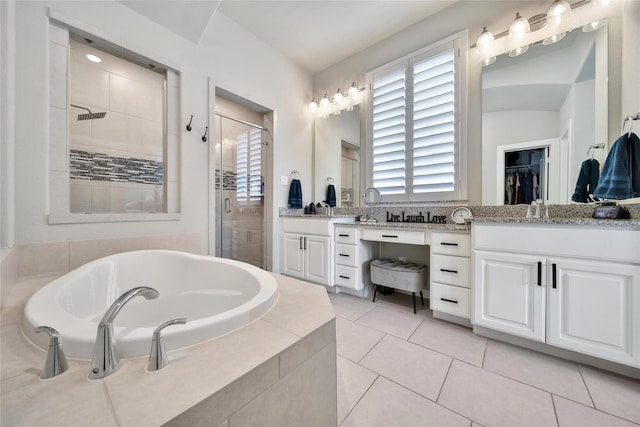 4327 Sage Glen Ln, Fulshear, TX 77441 - full bathroom featuring a stall shower, vanity, a garden tub, and tile patterned flooring