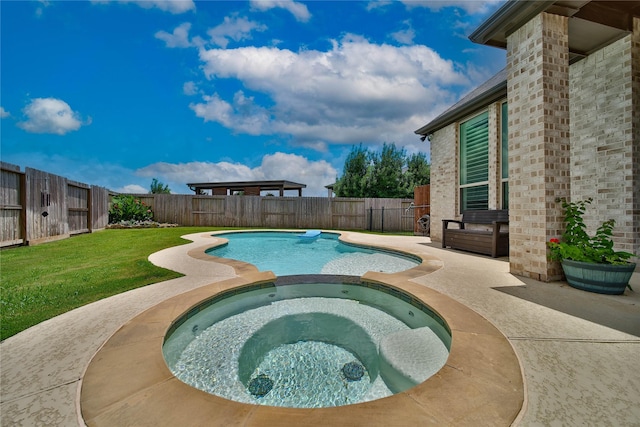4327 Sage Glen Ln, Fulshear, TX 77441 - view of swimming pool featuring a fenced backyard, a patio area, and a pool with connected hot tub