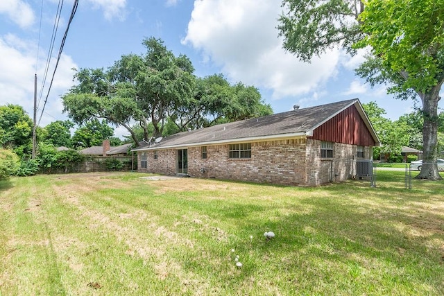 8111 Dellanera Dr, Hitchcock, TX 77563 - back of property with brick siding