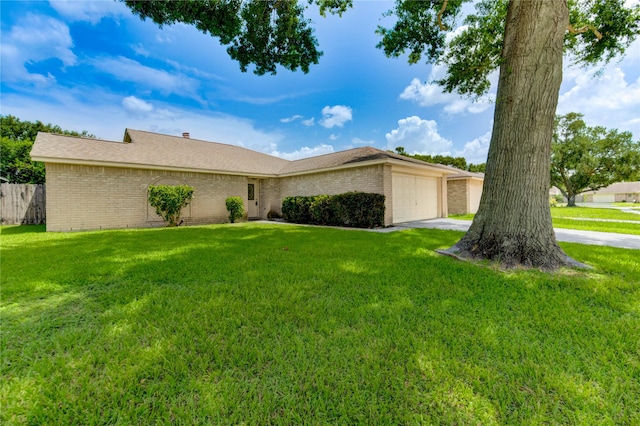 2710 Magnolia Ct, Stafford, TX 77477 - ranch-style house with brick siding, a garage, and driveway