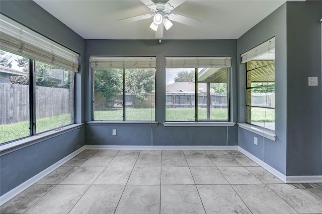 2710 Magnolia Ct, Stafford, TX 77477 - unfurnished sunroom featuring ceiling fan and plenty of natural light