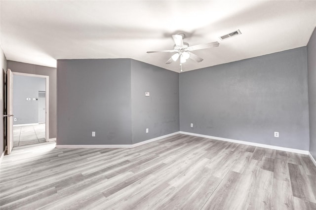 2710 Magnolia Ct, Stafford, TX 77477 - empty room featuring a ceiling fan and light wood-style flooring