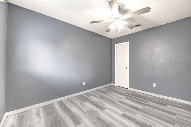 2710 Magnolia Ct, Stafford, TX 77477 - unfurnished room featuring wood finished floors and a ceiling fan