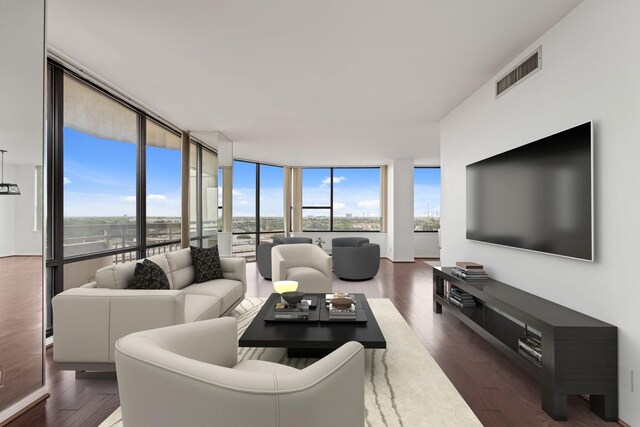 15 Greenway Plz Unit 10G, Houston, TX 77046 - living area with expansive windows, dark wood-style flooring, and plenty of natural light