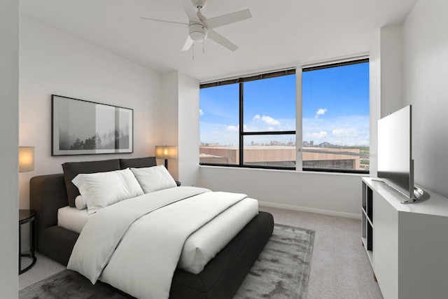 15 Greenway Plz Unit 10G, Houston, TX 77046 - carpeted bedroom with a ceiling fan and baseboards