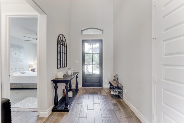 6907 Pondhawk Dr, Katy, TX 77493 - entryway featuring wood finished floors and ceiling fan