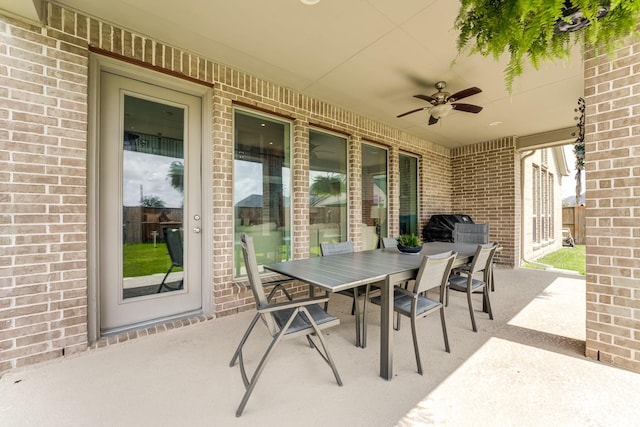 6907 Pondhawk Dr, Katy, TX 77493 - view of patio featuring a ceiling fan and outdoor dining area