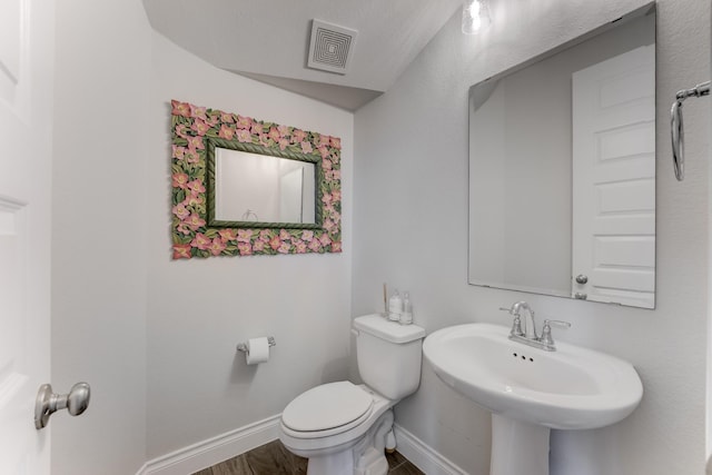 6907 Pondhawk Dr, Katy, TX 77493 - half bath with baseboards and wood finished floors