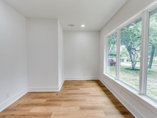 527 Blakeley Dr, San Antonio, TX 78209 - unfurnished room with healthy amount of natural light, light wood-style floors, and recessed lighting