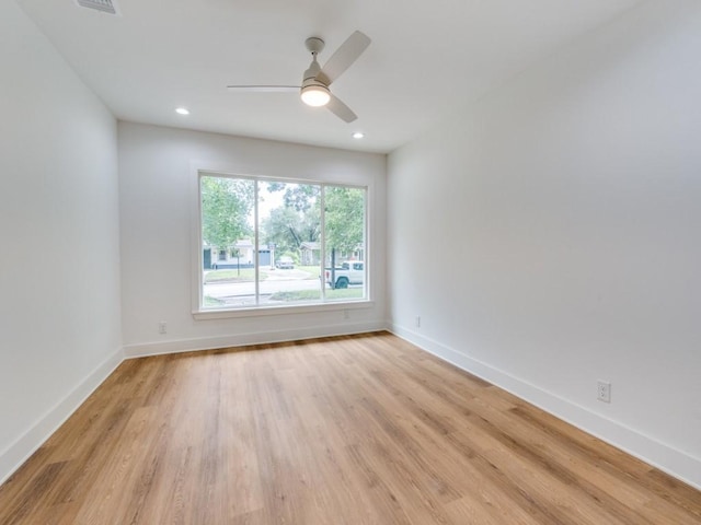 527 Blakeley Dr, San Antonio, TX 78209 - unfurnished room featuring light wood finished floors, ceiling fan, and recessed lighting
