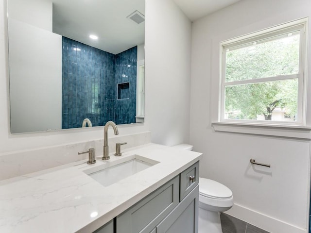 527 Blakeley Dr, San Antonio, TX 78209 - full bathroom featuring vanity, tile patterned flooring, and tiled shower