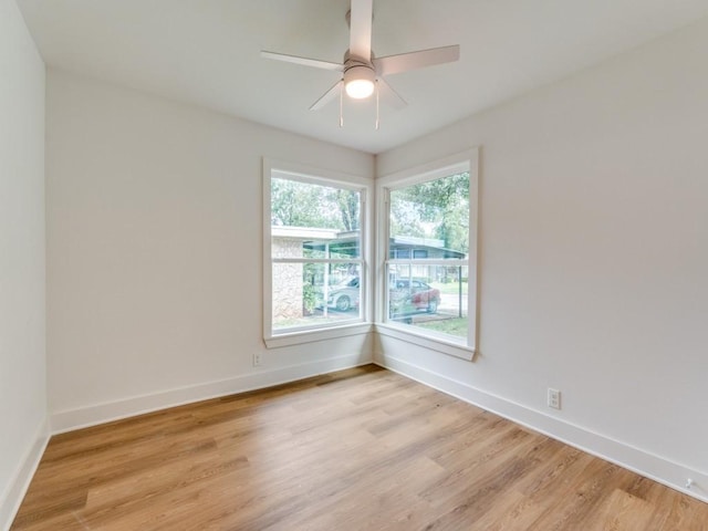527 Blakeley Dr, San Antonio, TX 78209 - empty room with light wood-style floors and a ceiling fan