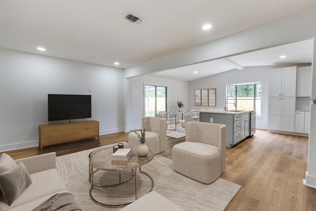 527 Blakeley Dr, San Antonio, TX 78209 - living area with plenty of natural light, light wood finished floors, and recessed lighting