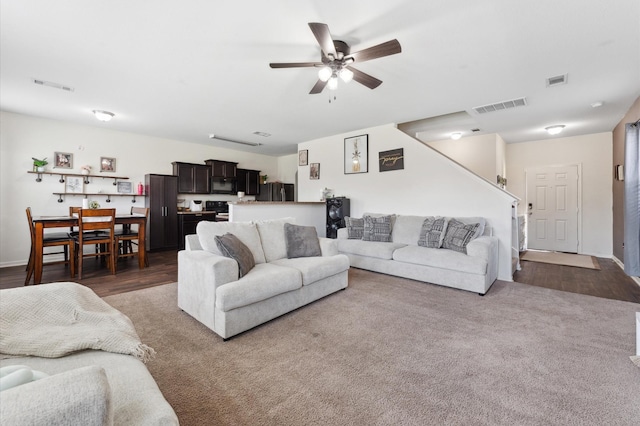 2415 Fallen Pine Ln, Houston, TX 77088 - living room featuring a ceiling fan and carpet floors