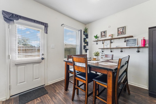 2415 Fallen Pine Ln, Houston, TX 77088 - dining area with dark wood-style floors