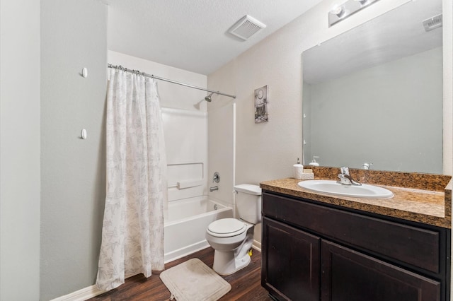 2415 Fallen Pine Ln, Houston, TX 77088 - bathroom featuring wood finished floors, vanity, and shower / bath combo with shower curtain