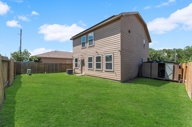 2415 Fallen Pine Ln, Houston, TX 77088 - back of property featuring a fenced backyard and a shed