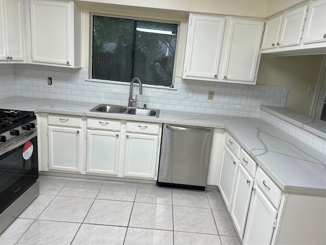 7502 Grackle Dr, Cypress, TX 77433 - kitchen with stainless steel appliances, white cabinets, and tasteful backsplash
