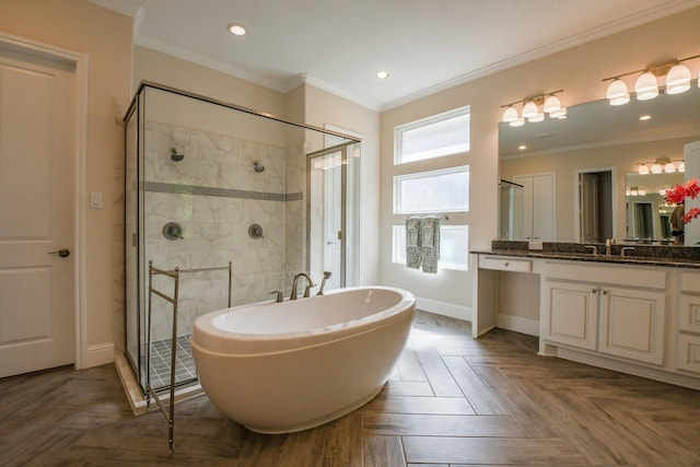 9411 Plaza Point Dr, Missouri City, TX 77459 - bathroom featuring a soaking tub, a shower stall, vanity, ornamental molding, and recessed lighting