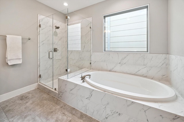 408 W Pierce St, Houston, TX 77019 - bathroom with a bath and a marble finish shower