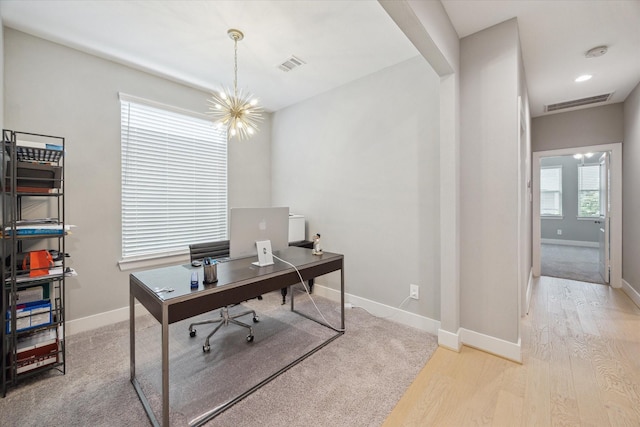 408 W Pierce St, Houston, TX 77019 - office area with a chandelier and light wood-style floors