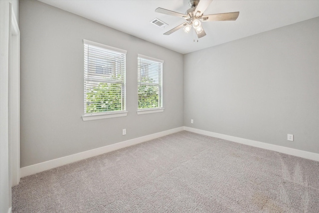 408 W Pierce St, Houston, TX 77019 - spare room featuring light carpet and ceiling fan