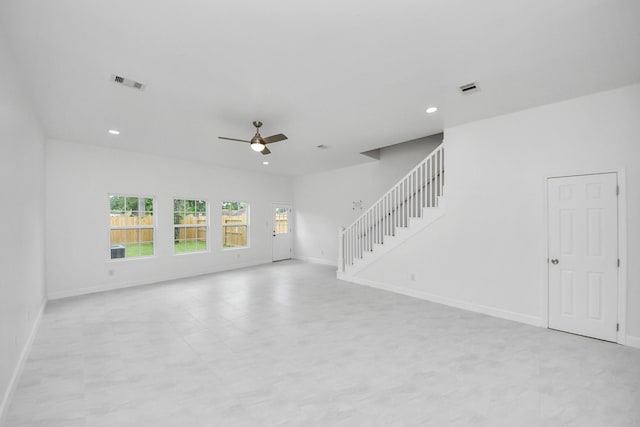 8159 Crestview Dr, Houston, TX 77028 - unfurnished living room with a ceiling fan, stairway, and recessed lighting