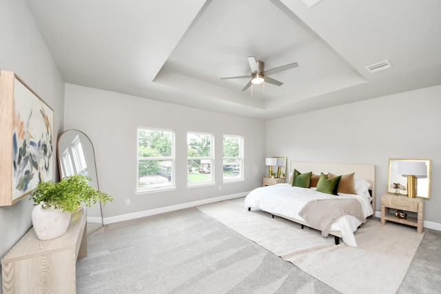 8159 Crestview Dr, Houston, TX 77028 - bedroom with a raised ceiling, light carpet, and ceiling fan