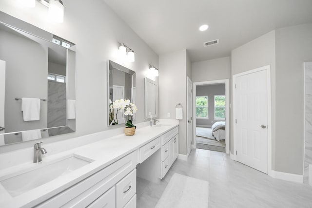 8159 Crestview Dr, Houston, TX 77028 - bathroom with double vanity, connected bathroom, and recessed lighting