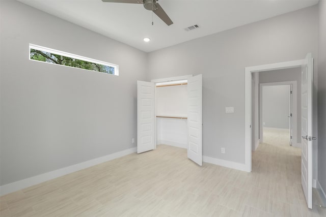 301 Knights Row, Horseshoe Bay, TX 78657 - unfurnished bedroom featuring a closet, a ceiling fan, and recessed lighting