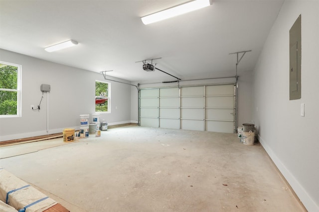 301 Knights Row, Horseshoe Bay, TX 78657 - garage with a garage door opener and electric panel