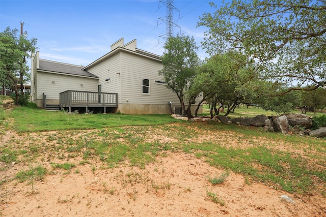 301 Knights Row, Horseshoe Bay, TX 78657 - back of house with a wooden deck and a lawn